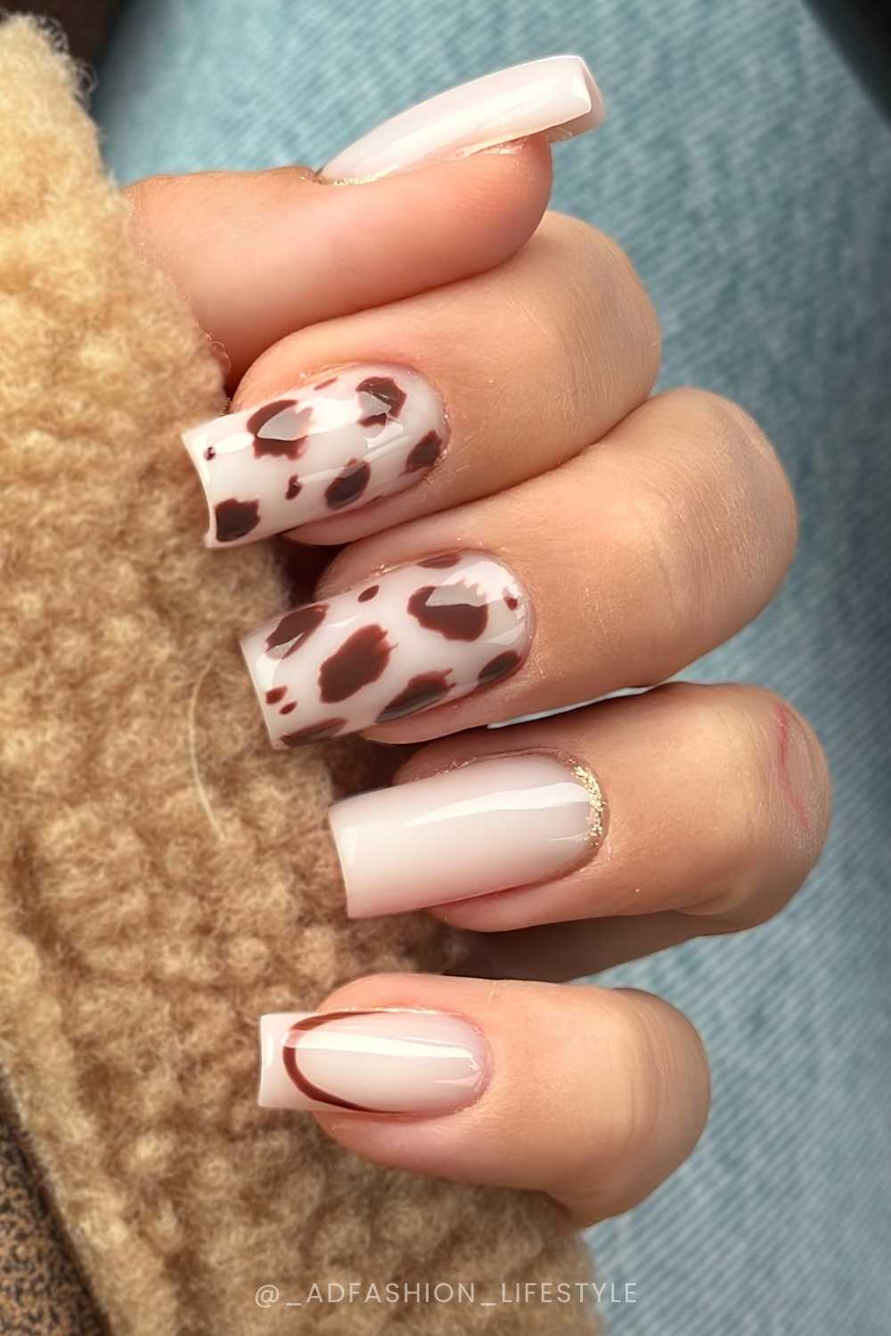 Milky white nails with brown cow print