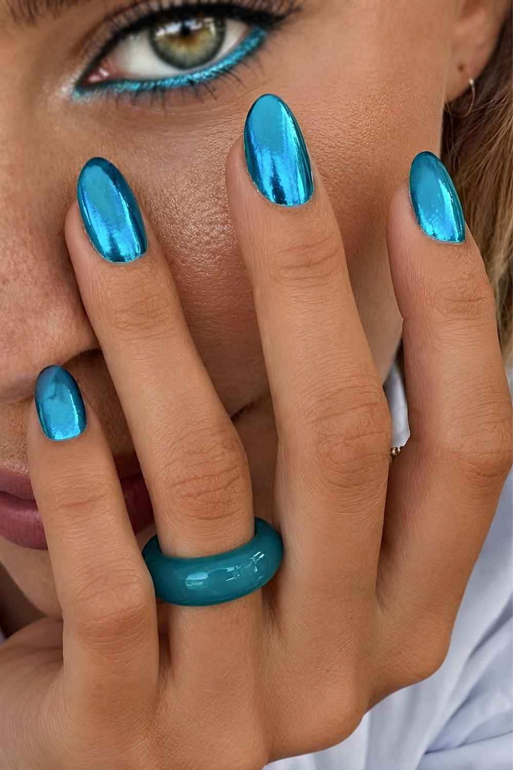Ocean blue chrome manicure