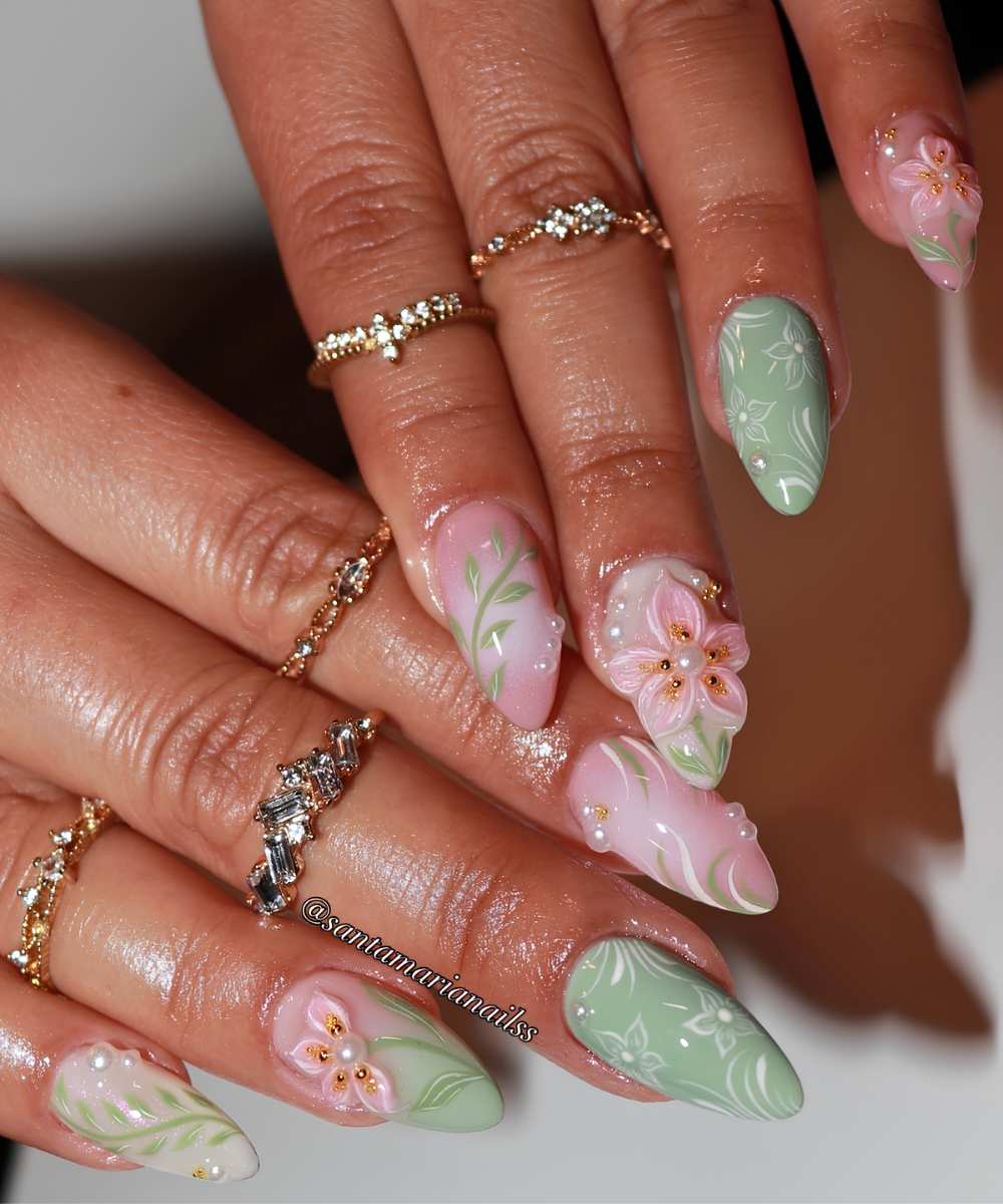 Pink and green nails with flowers and pearls