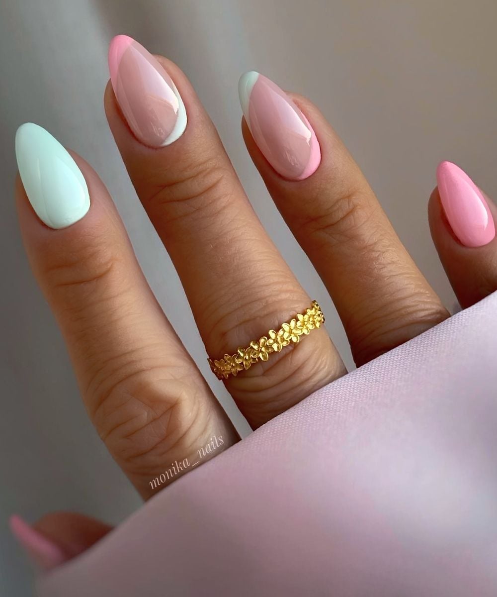 Pink and green nails with negative space design