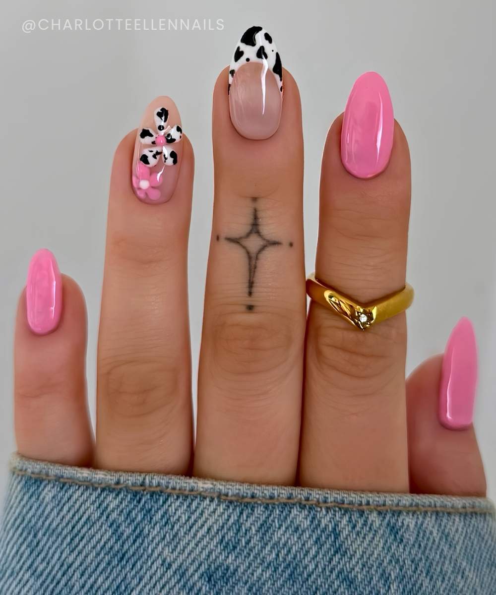Pink nails with cow print and flowers