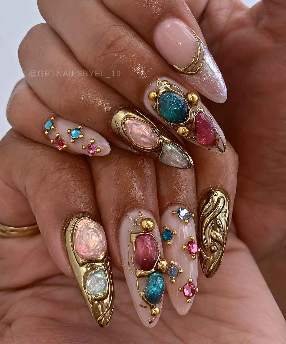 Pink nails with medallion-like ornaments