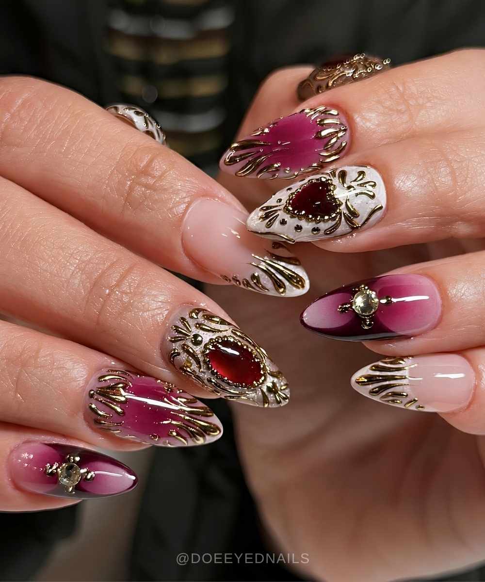 Ruby red mani with metallic baroque inspired art