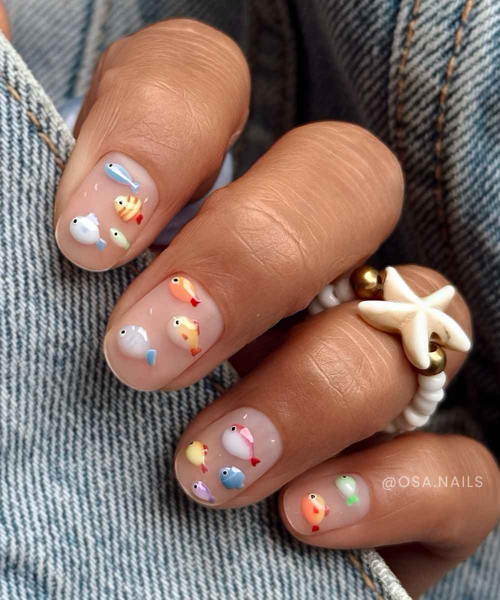 Sheer short nails with colorful fish art