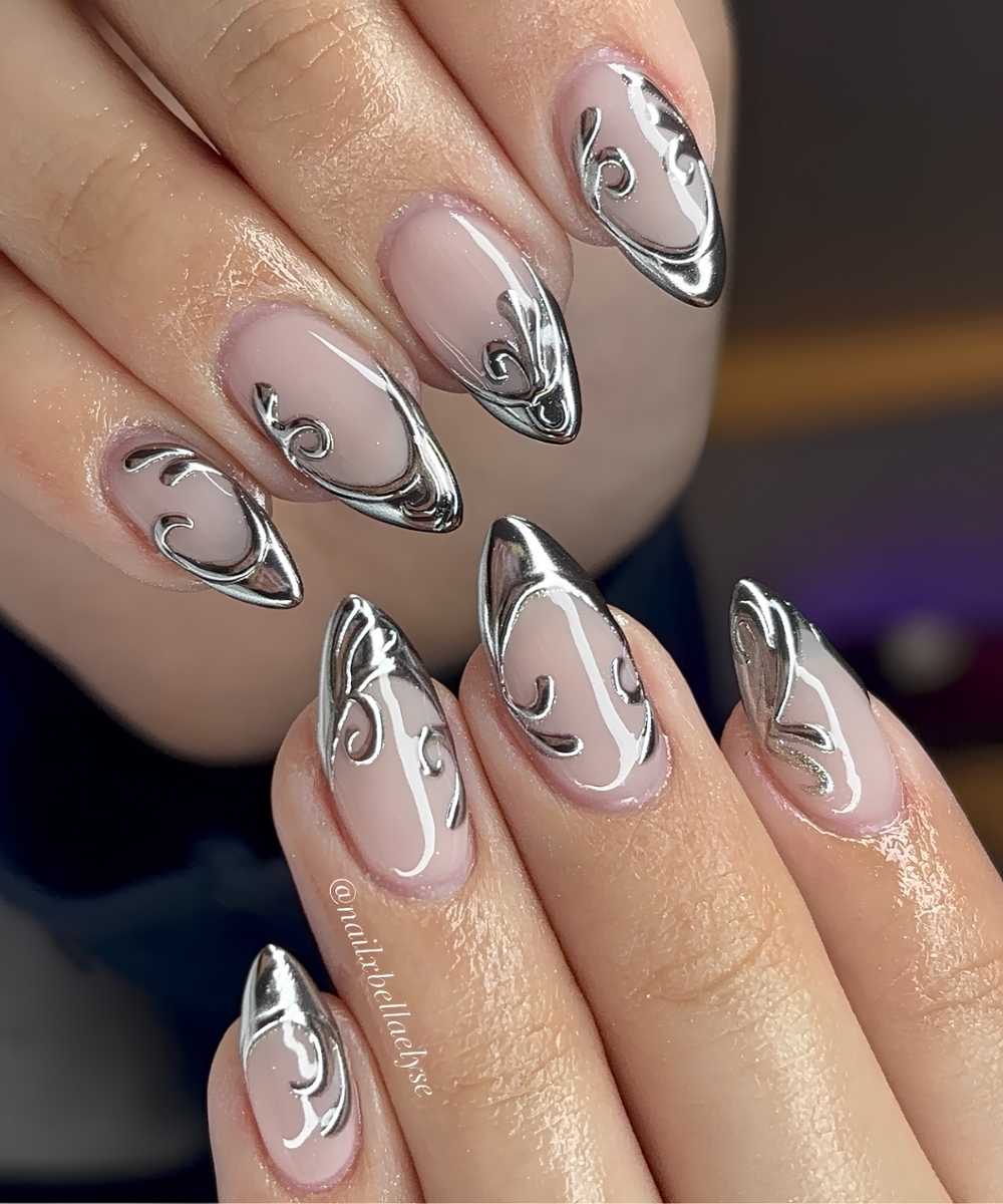 Silver chrome French nails with swirls