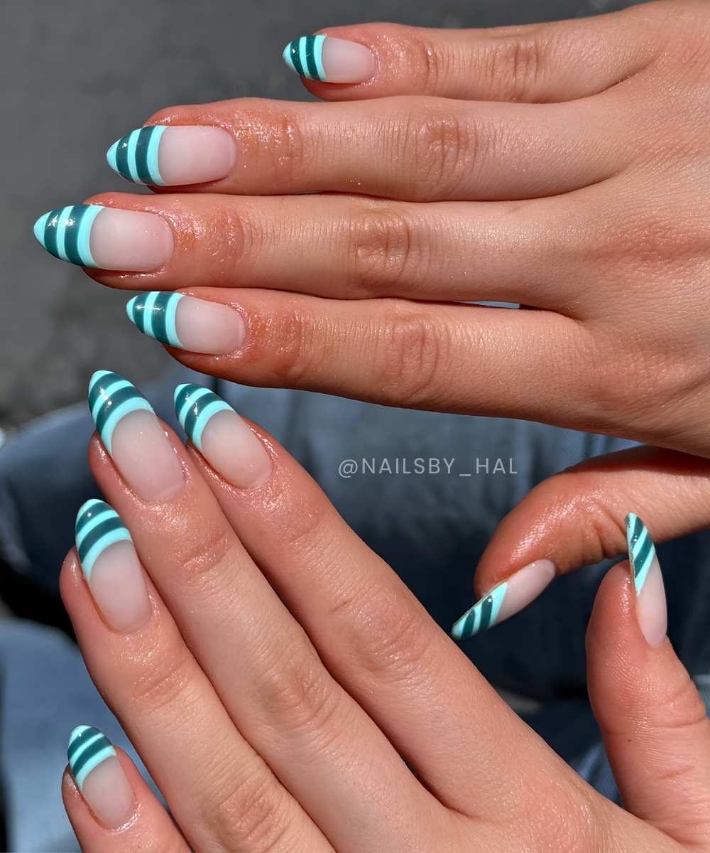 Striped French nails in two shades of teal