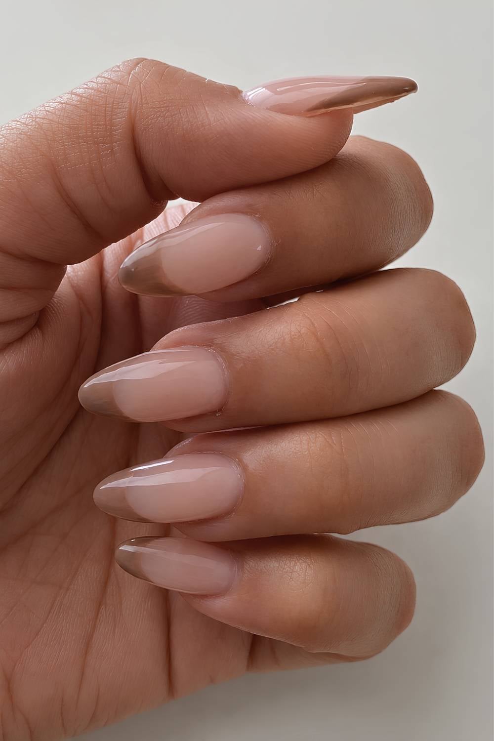 Taupe French tip nails