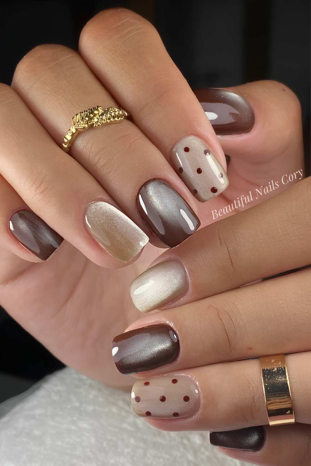 Taupe and brown cat eye nails with polka dots