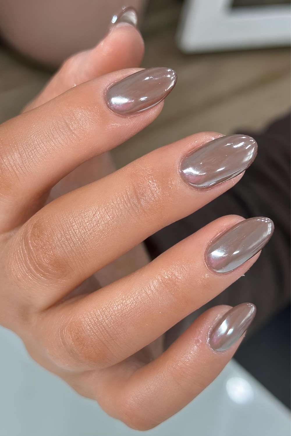 Taupe chrome manicure