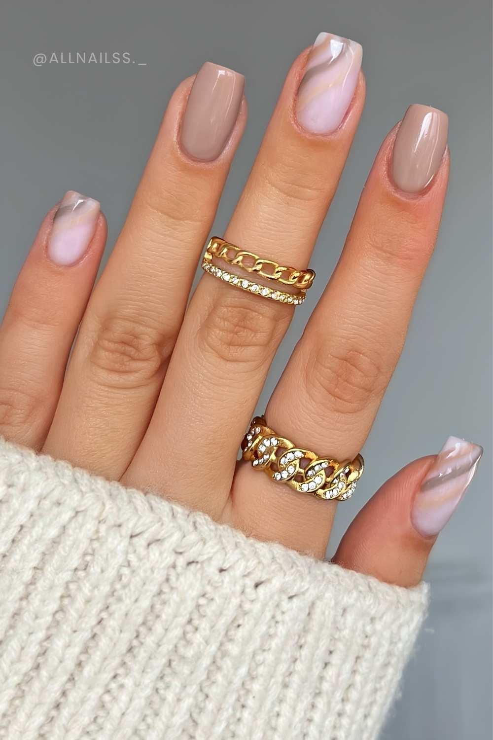 Taupe manicure with accent linework