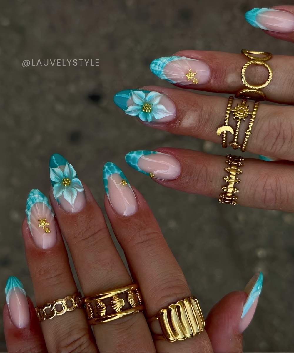Teal French nails with seashells and flowers