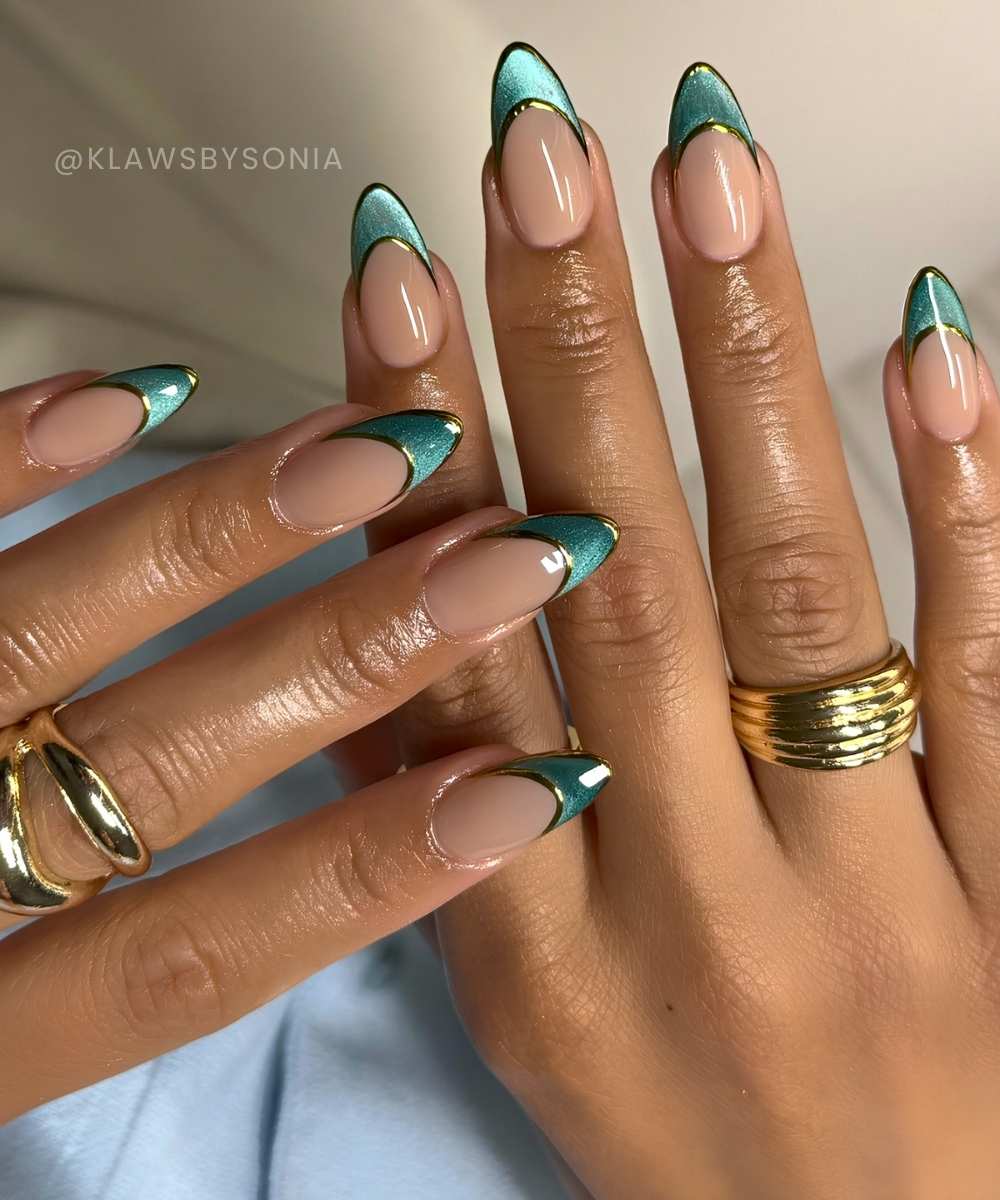 Teal green cat eye French nails with gold outlines