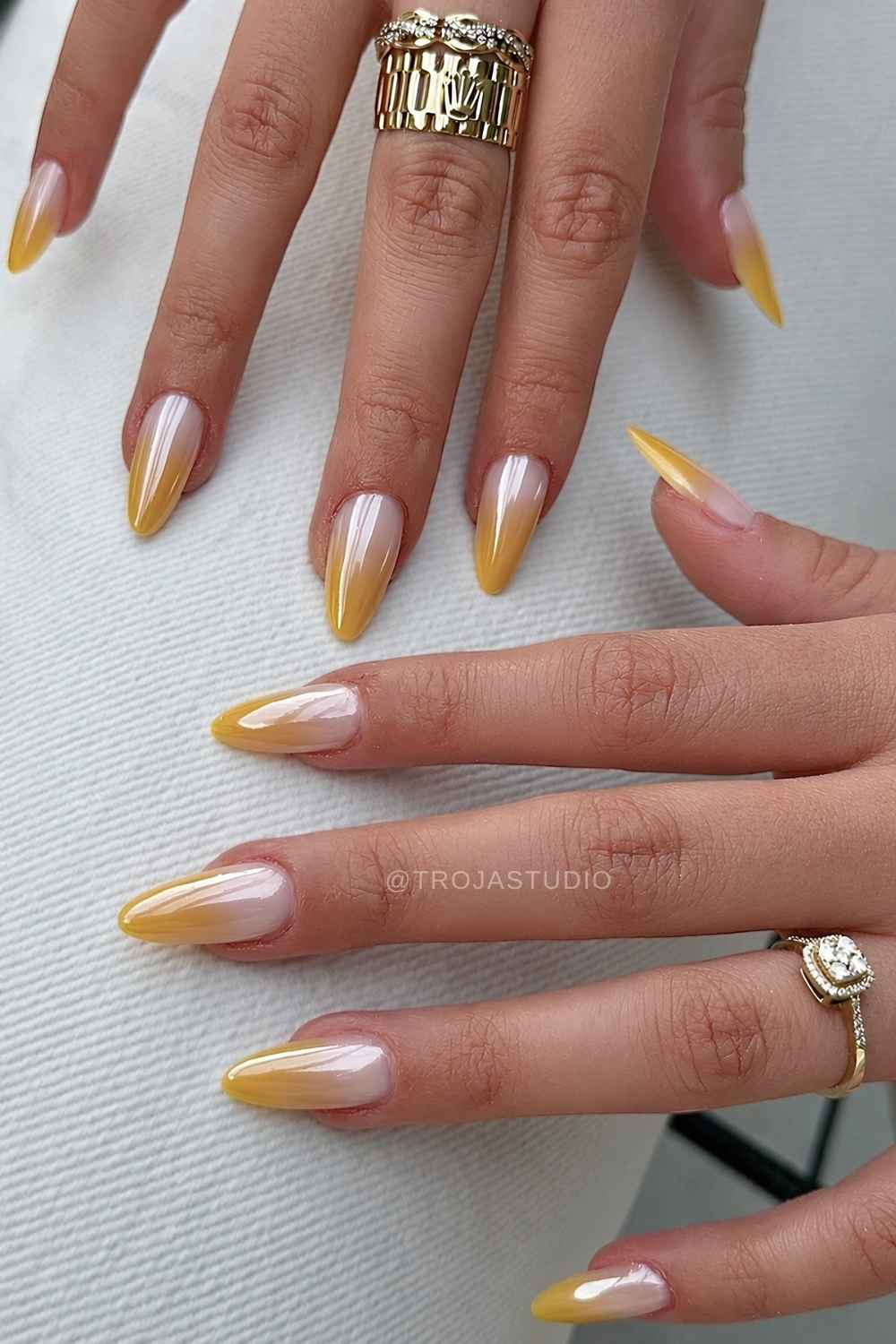Vibrant yellow chrome ombre nails