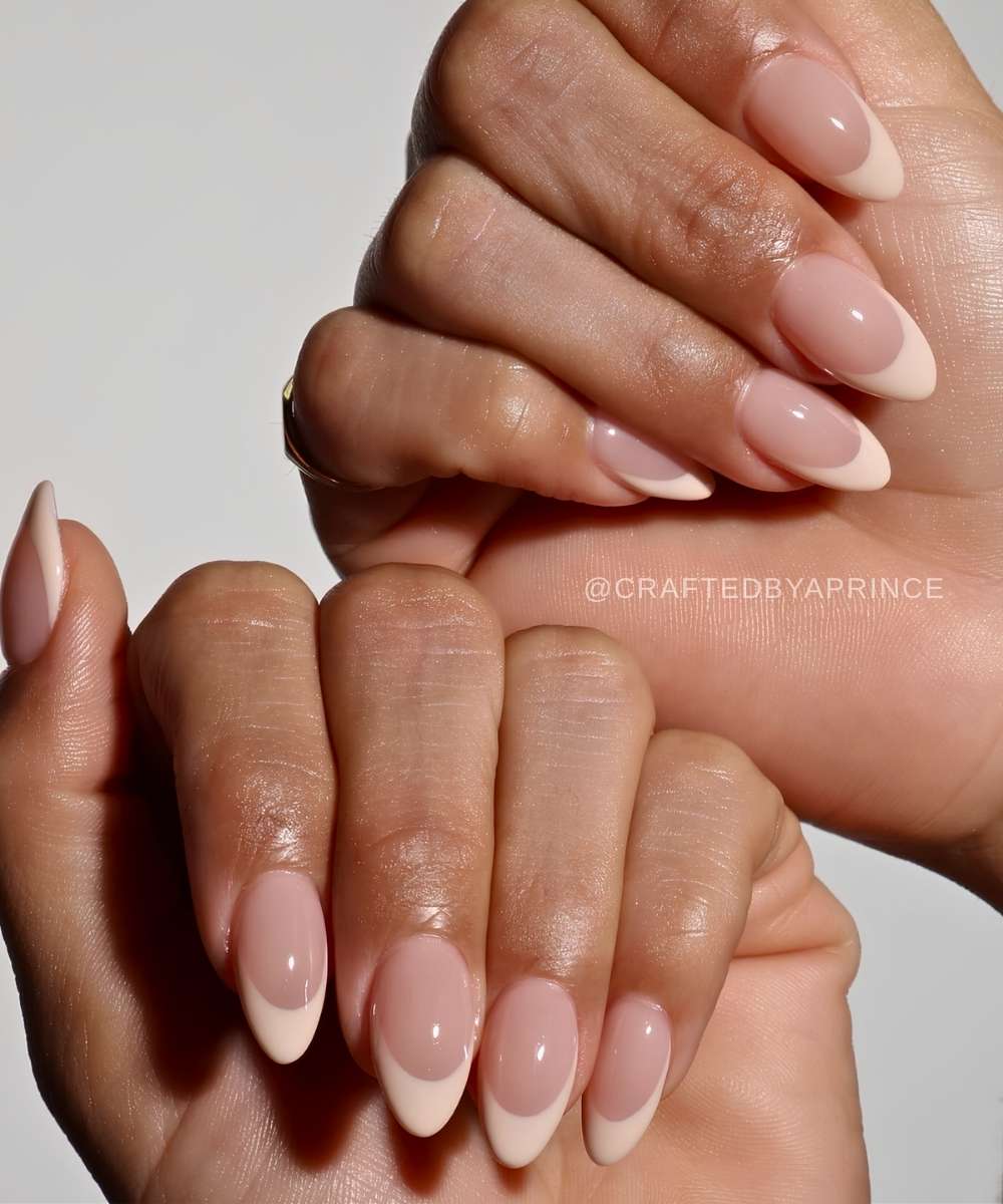 Almond beige French tip mani