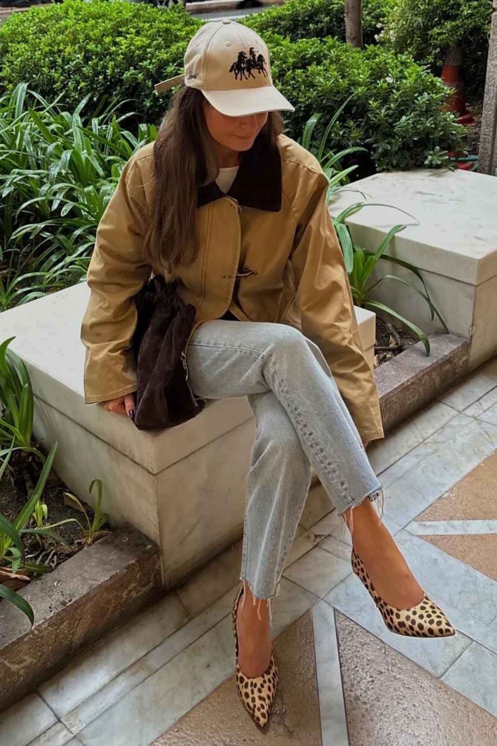Barn jacket with light wash jeans and leopard heels