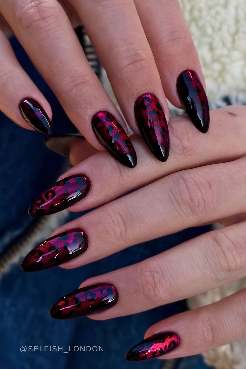 Black and red cat eye nails with leopard print