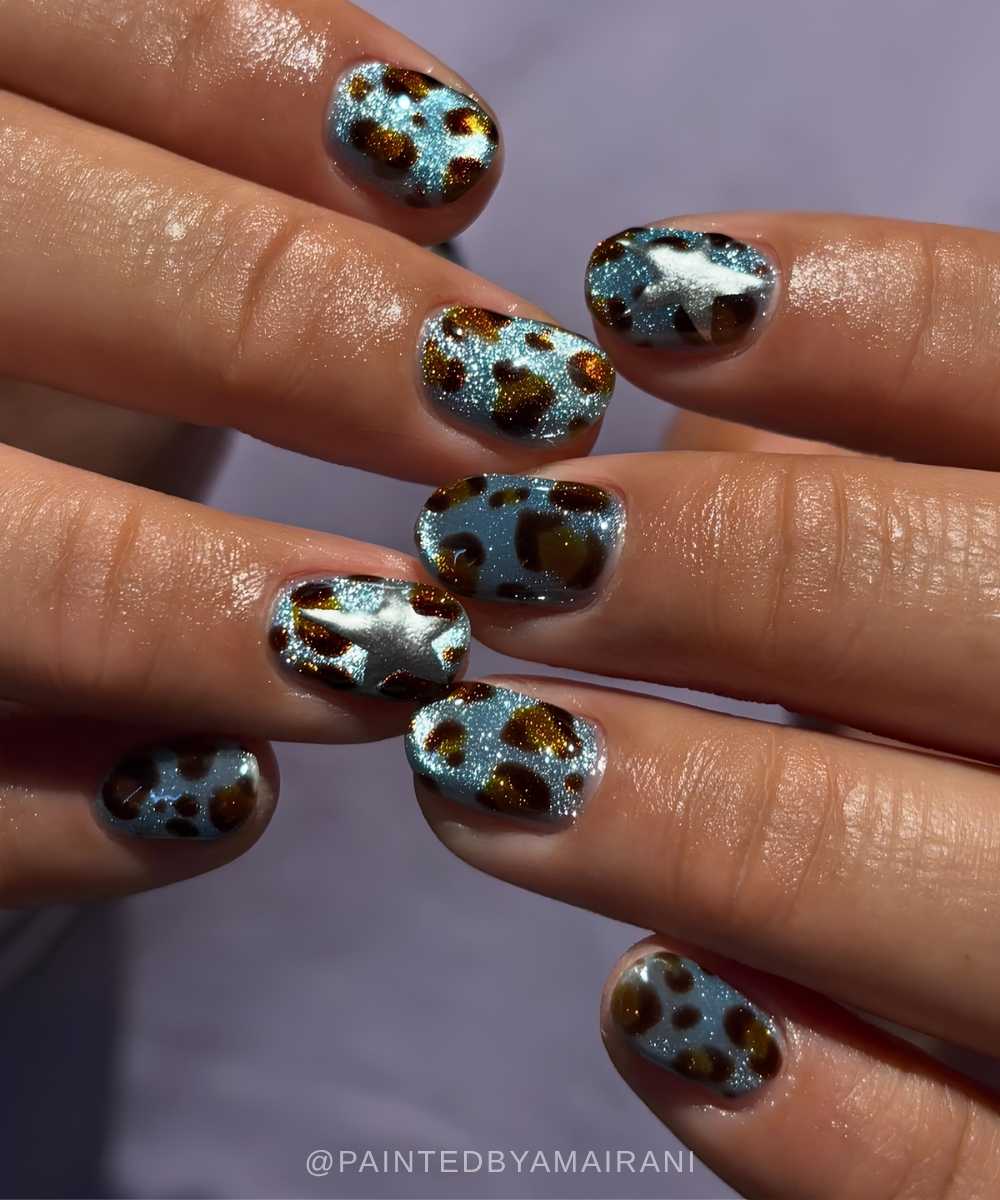Blue velvet cat eye mani with brown leopard print