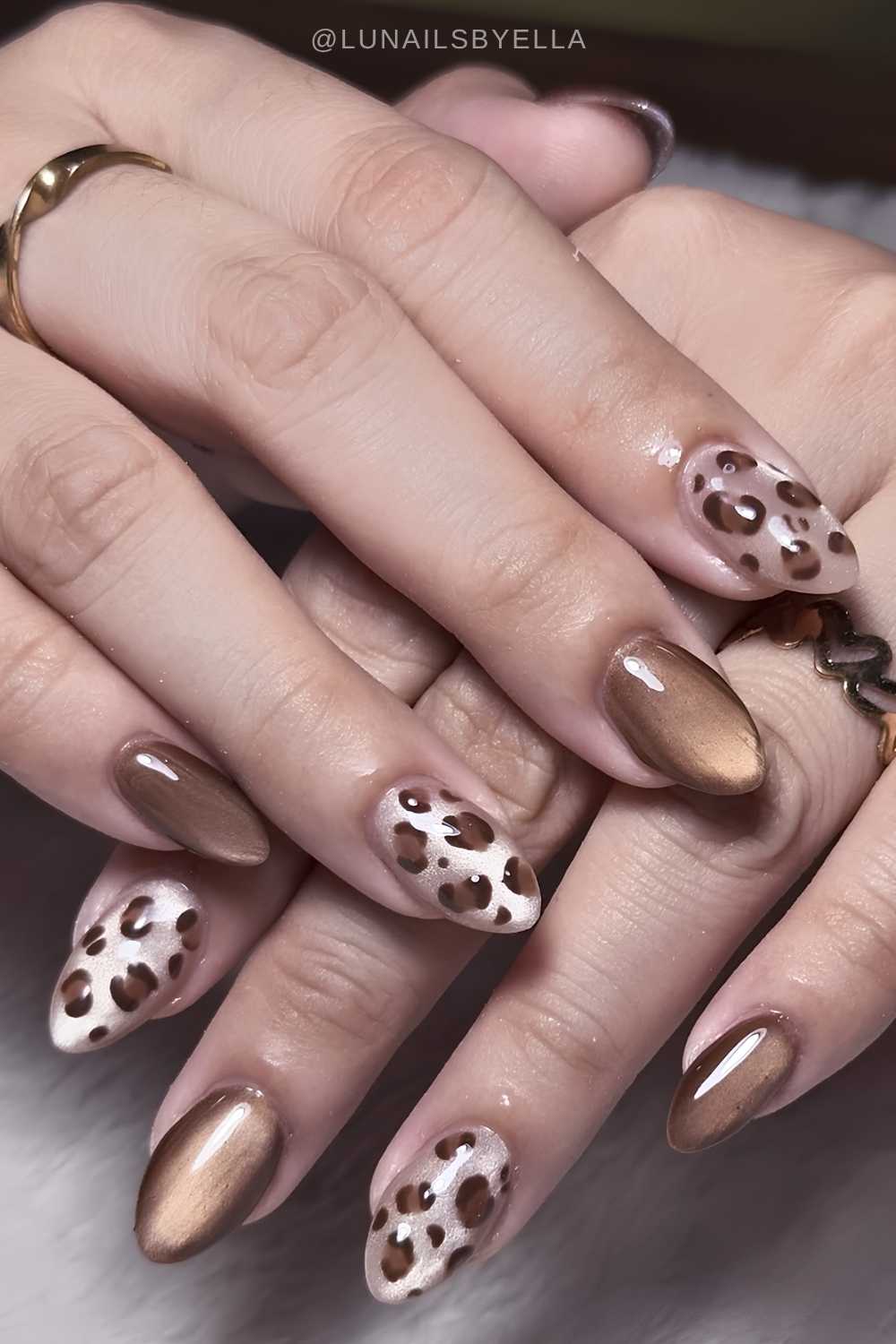 Brown and white cat eye mani with leopard print