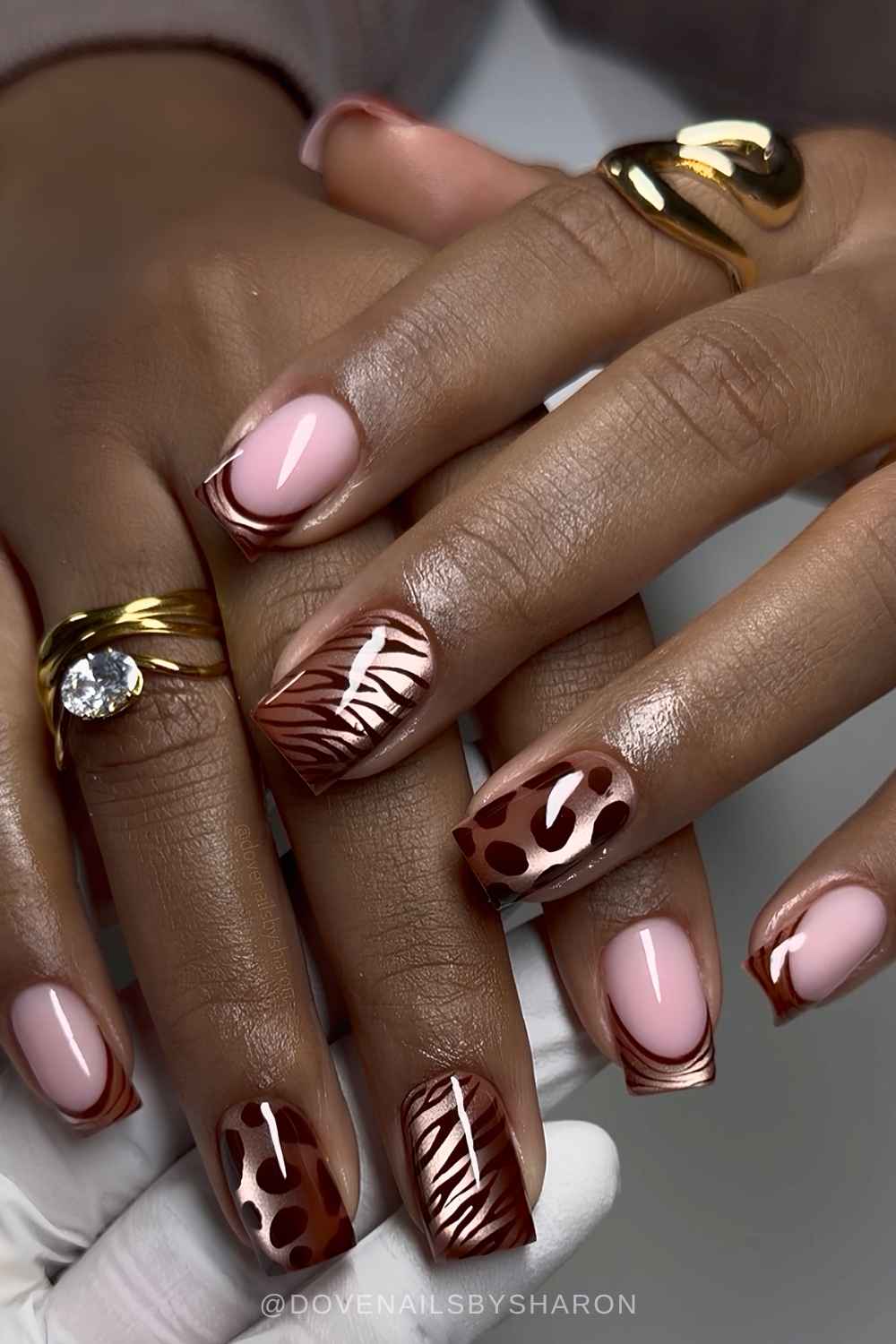 Brown cat eye mani with mixed animal prints