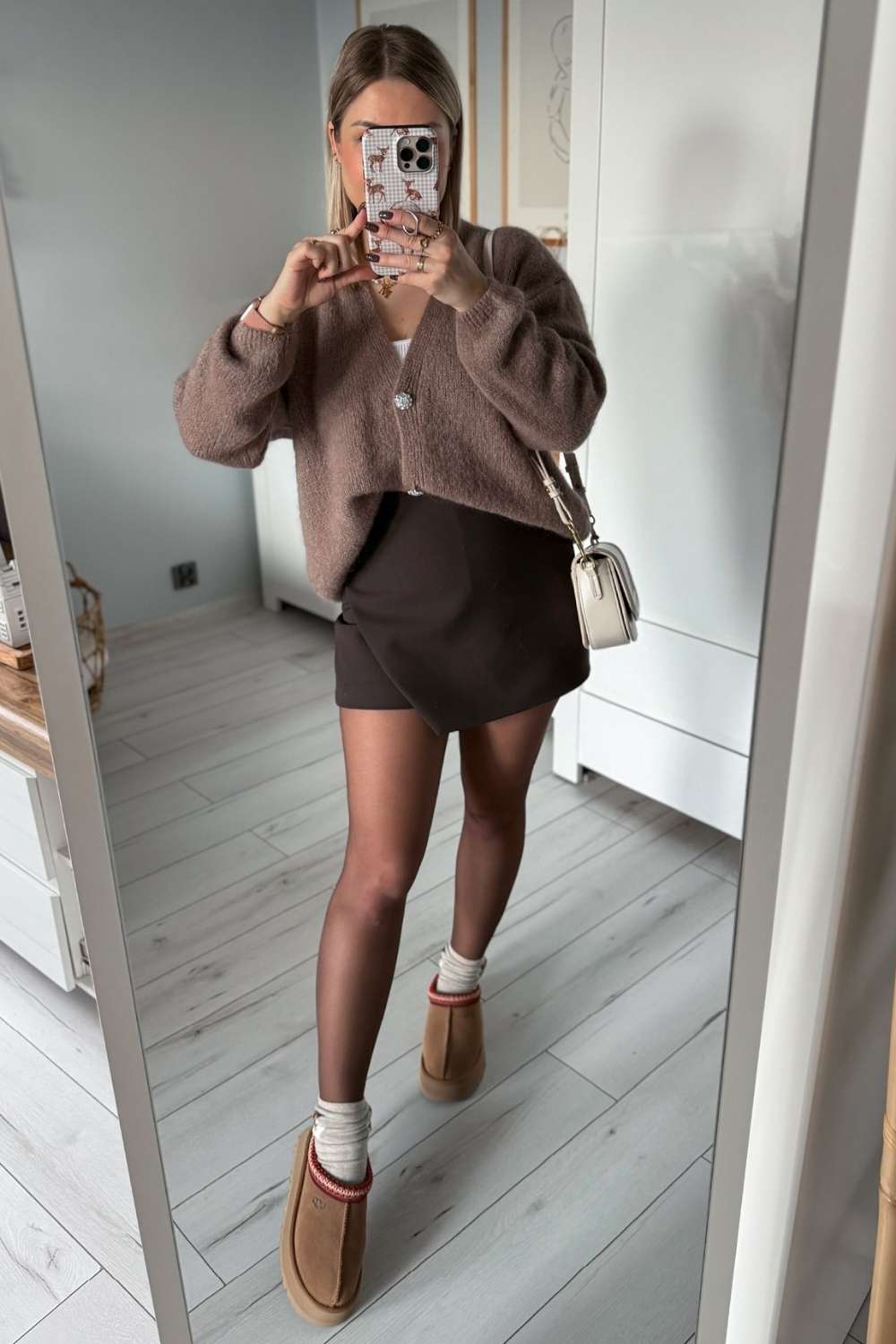 Brown mini skirt with cardigan and mini uggs