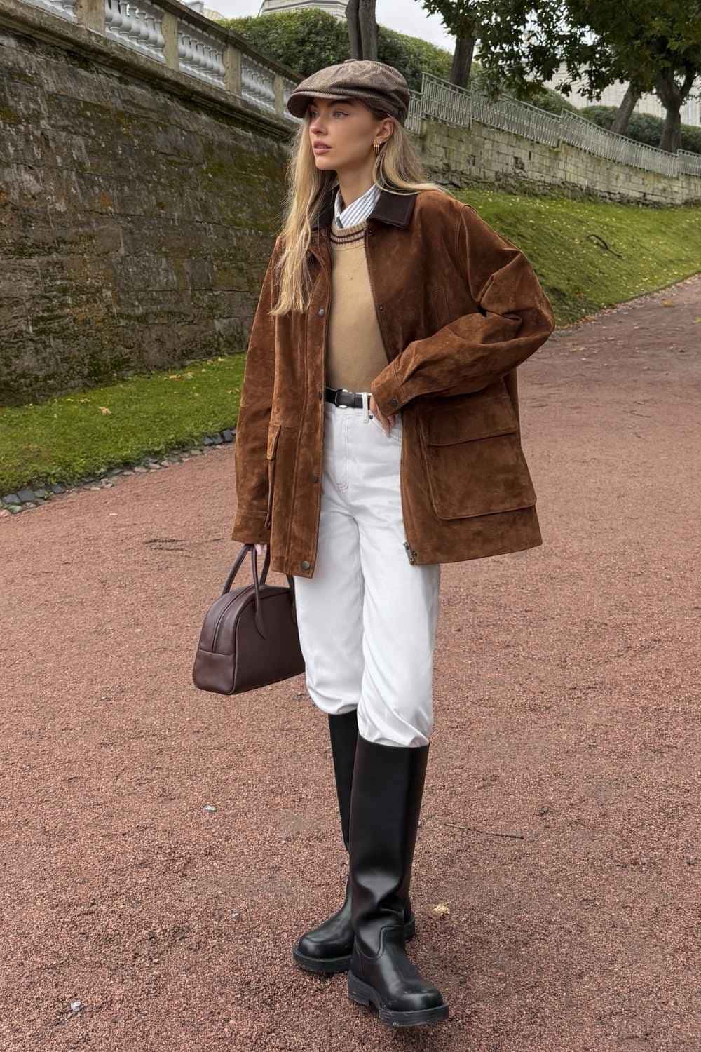Brown suede barn jacket with white jeans and black boots
