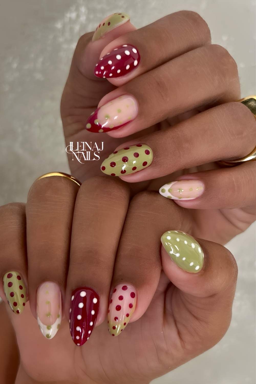 Burgundy and matcha green polka dot mani