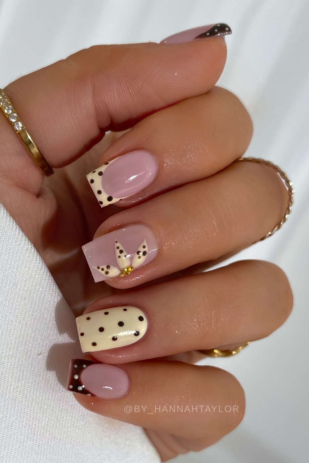 Burgundy and yellow nails with flowers and dots