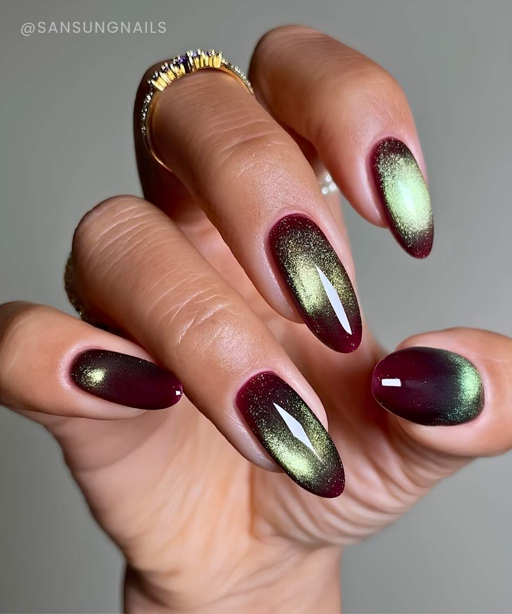 Burgundy cat eye mani with green flash