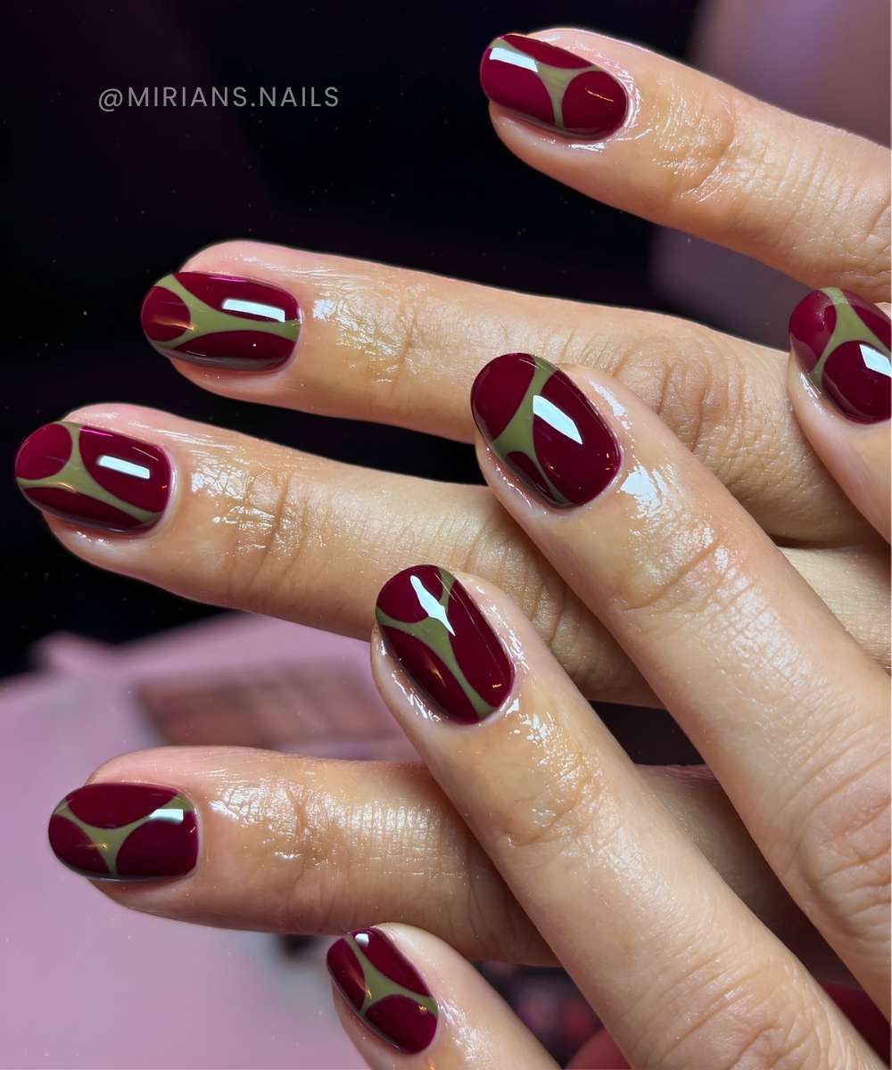Burgundy nails with olive green line art