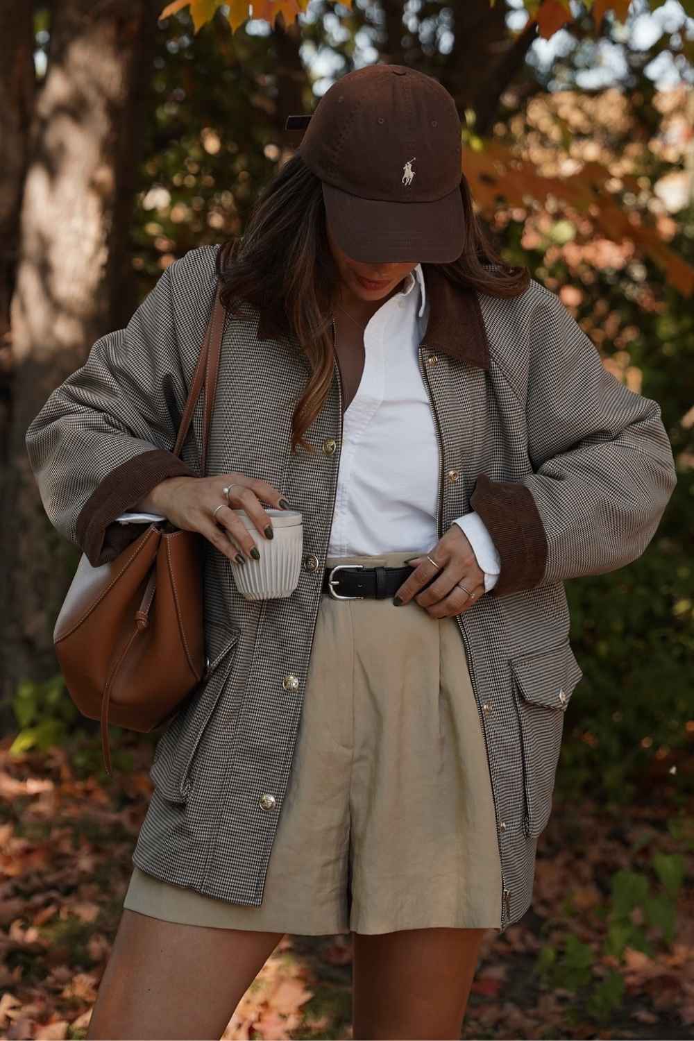 Checked barn jacket with white shirt and tailored shorts