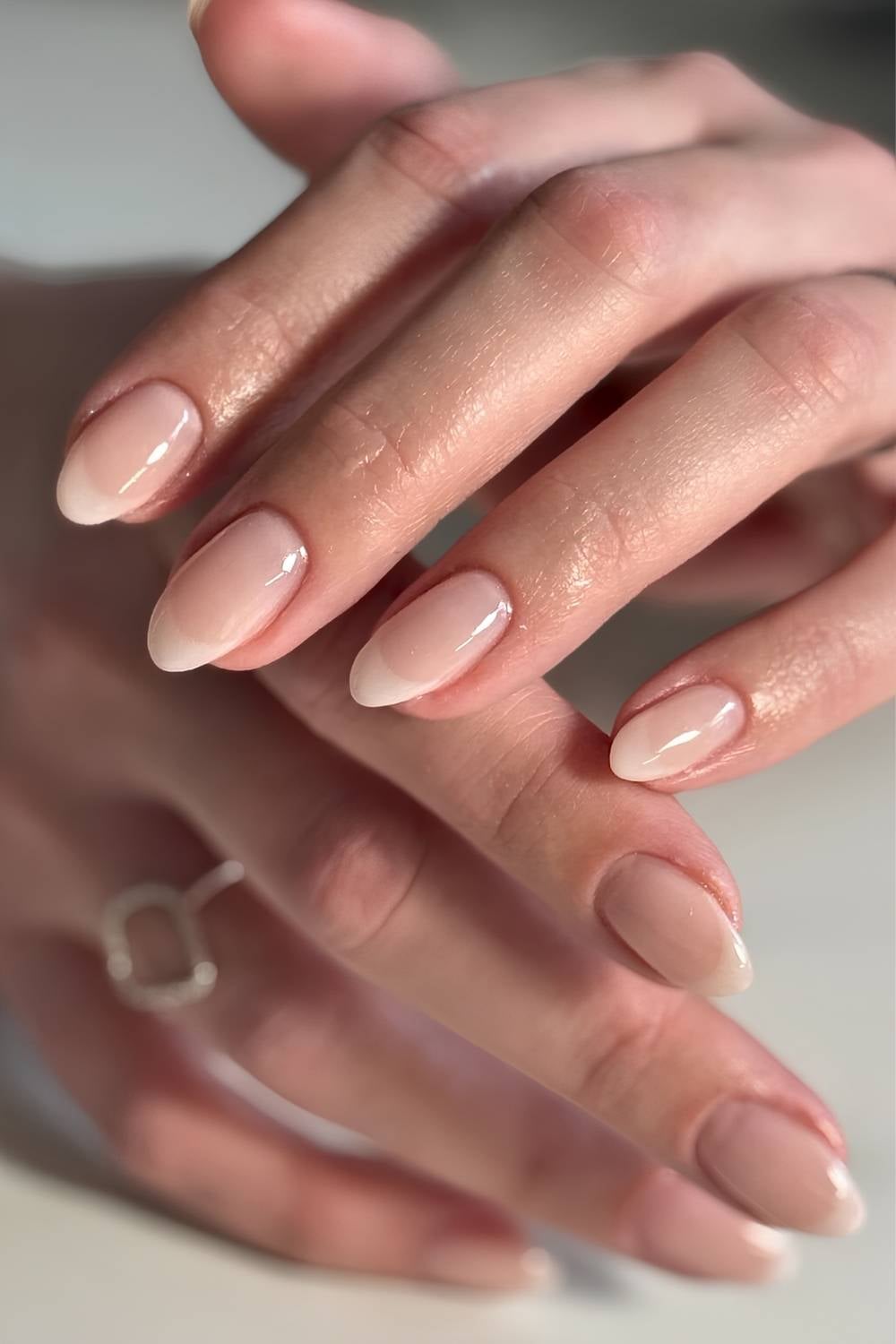 Cloudy French manicure on a nude base