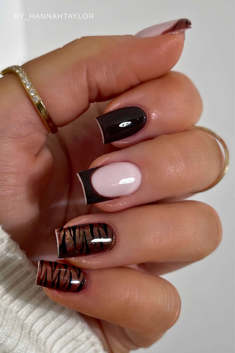Dark brown nails with accent magnetic animal print