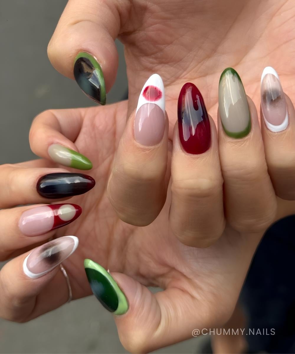 Deep red and muted green mismatched nails