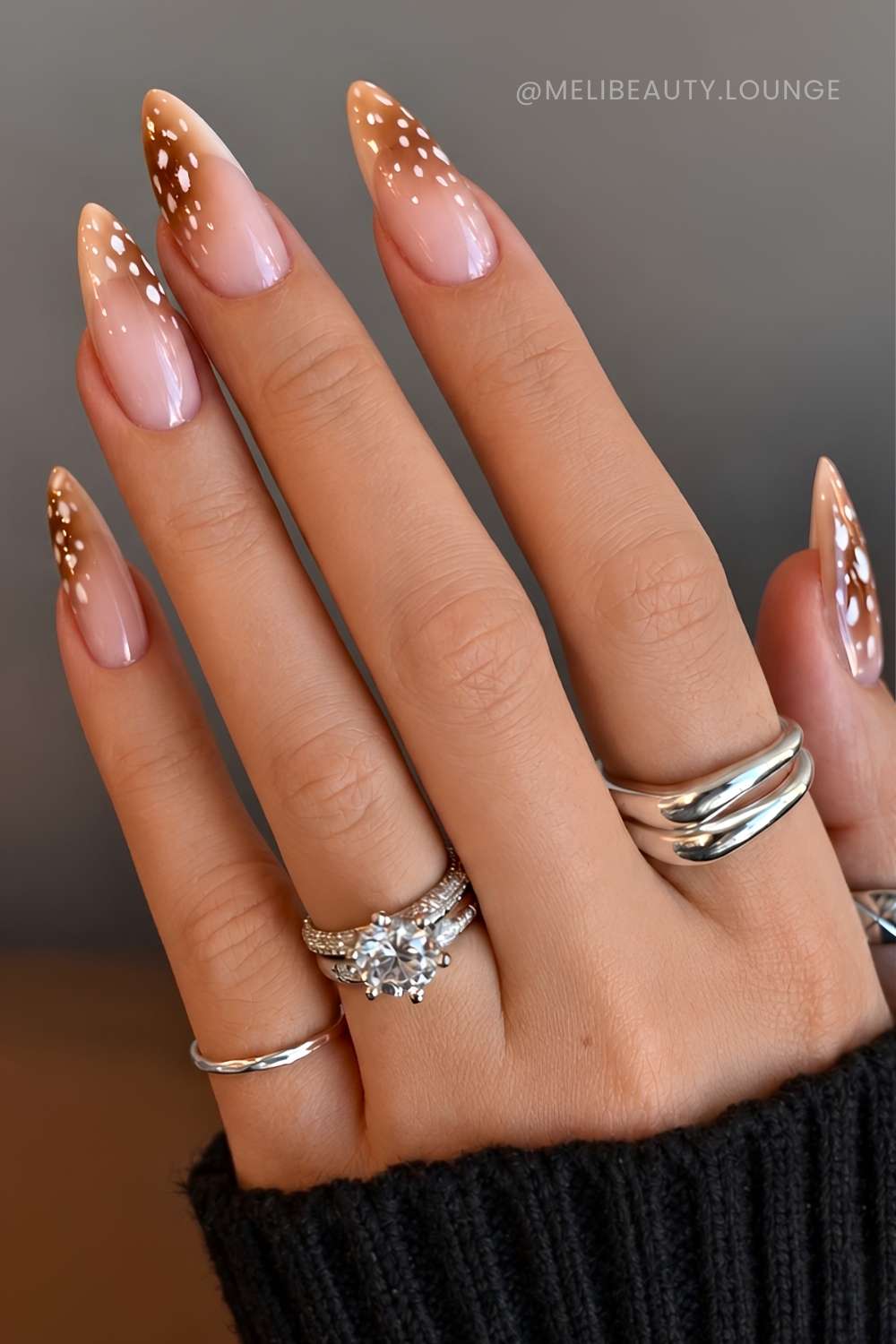 Fawn print manicure in nude colors