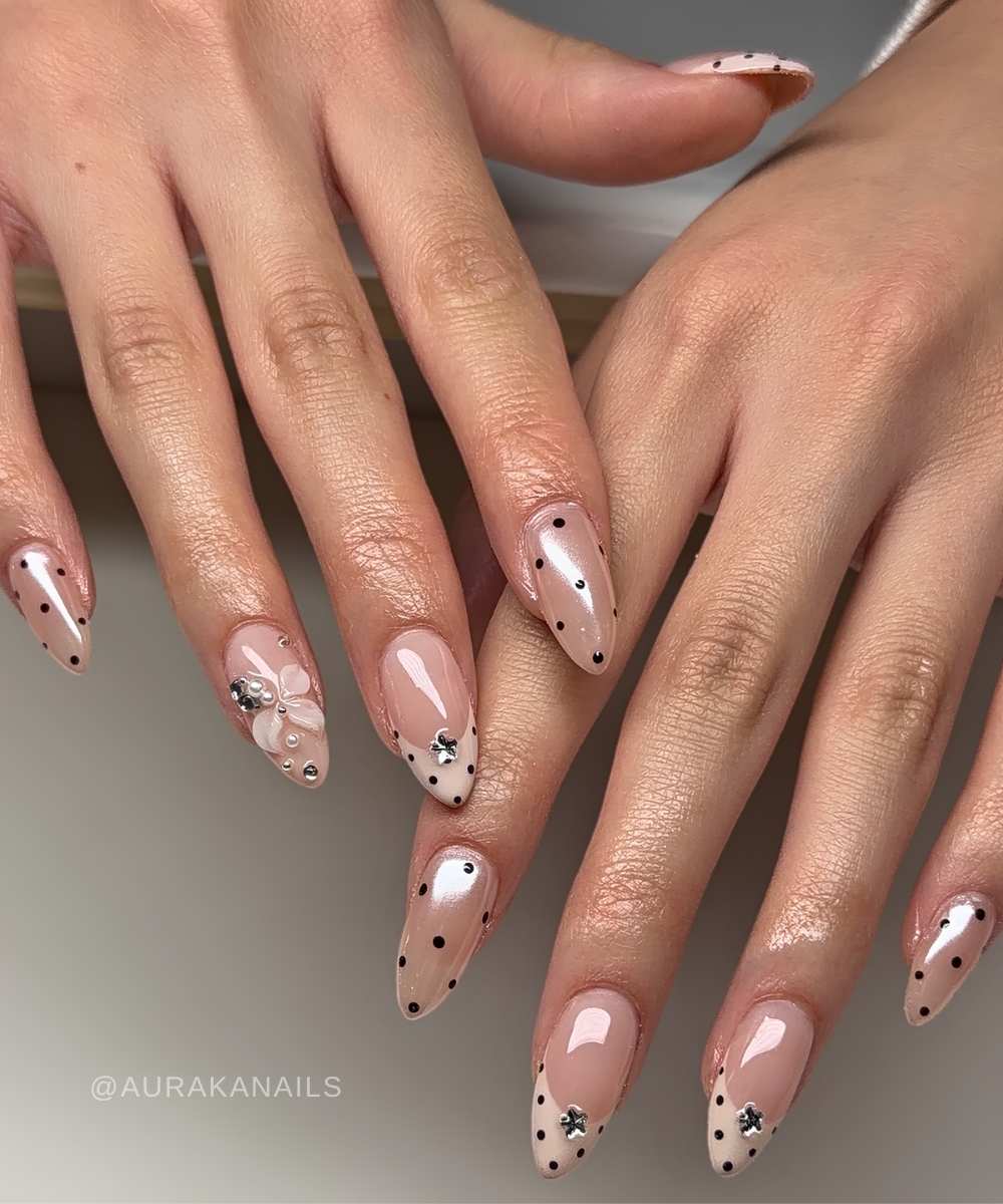Glazed beige French nails with dots and flowers