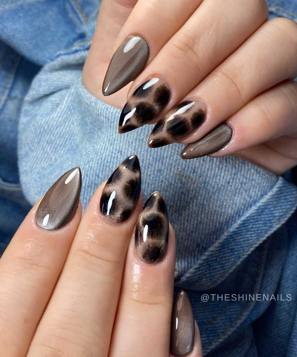 Gray cat eye nails with accent animal print