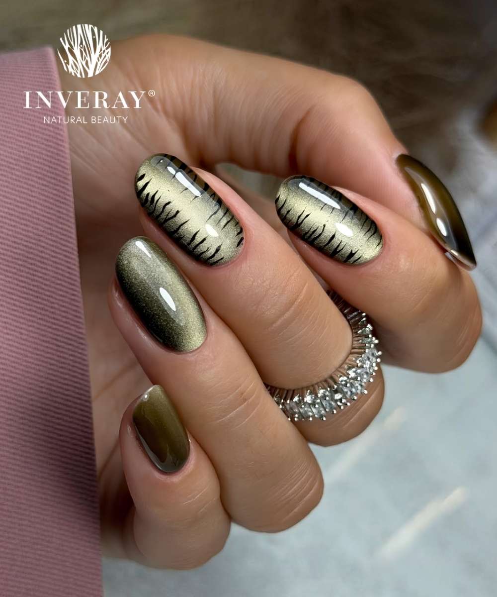 Green cat eye nails with animal print