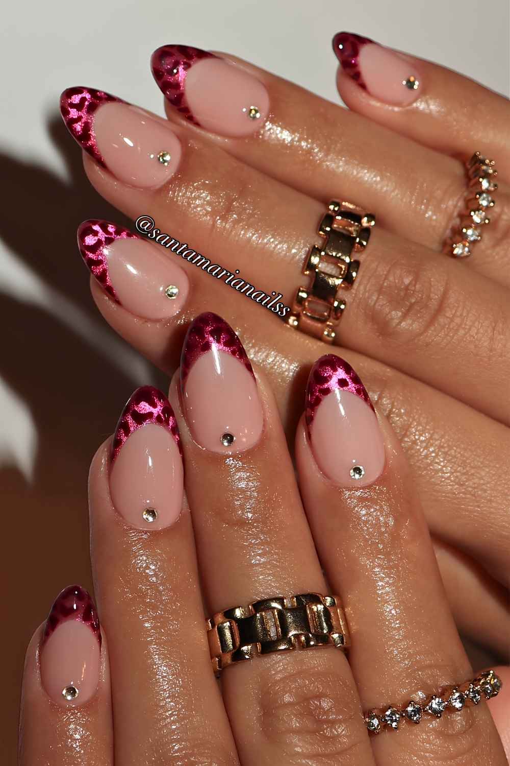 Pink cat eye French mani with leopard print