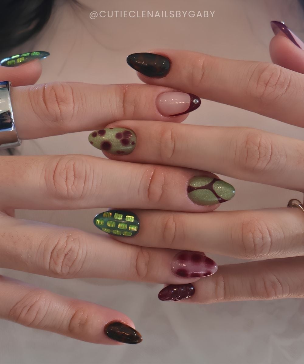 Plum and olive nails with sequins and blooming gel