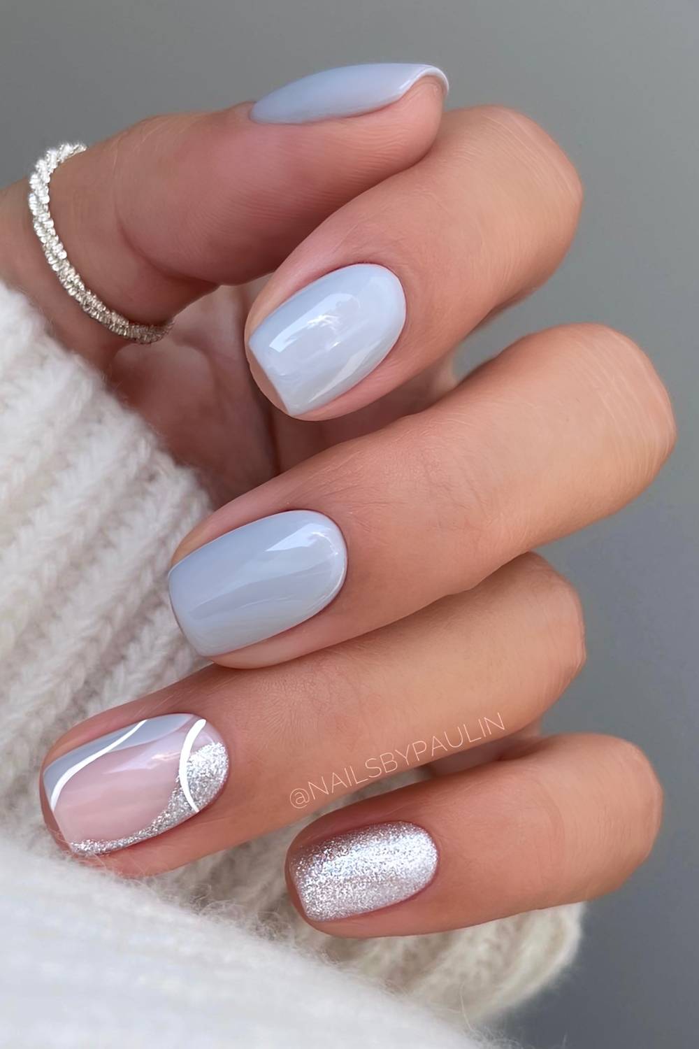 Short gray mani with silver glitter