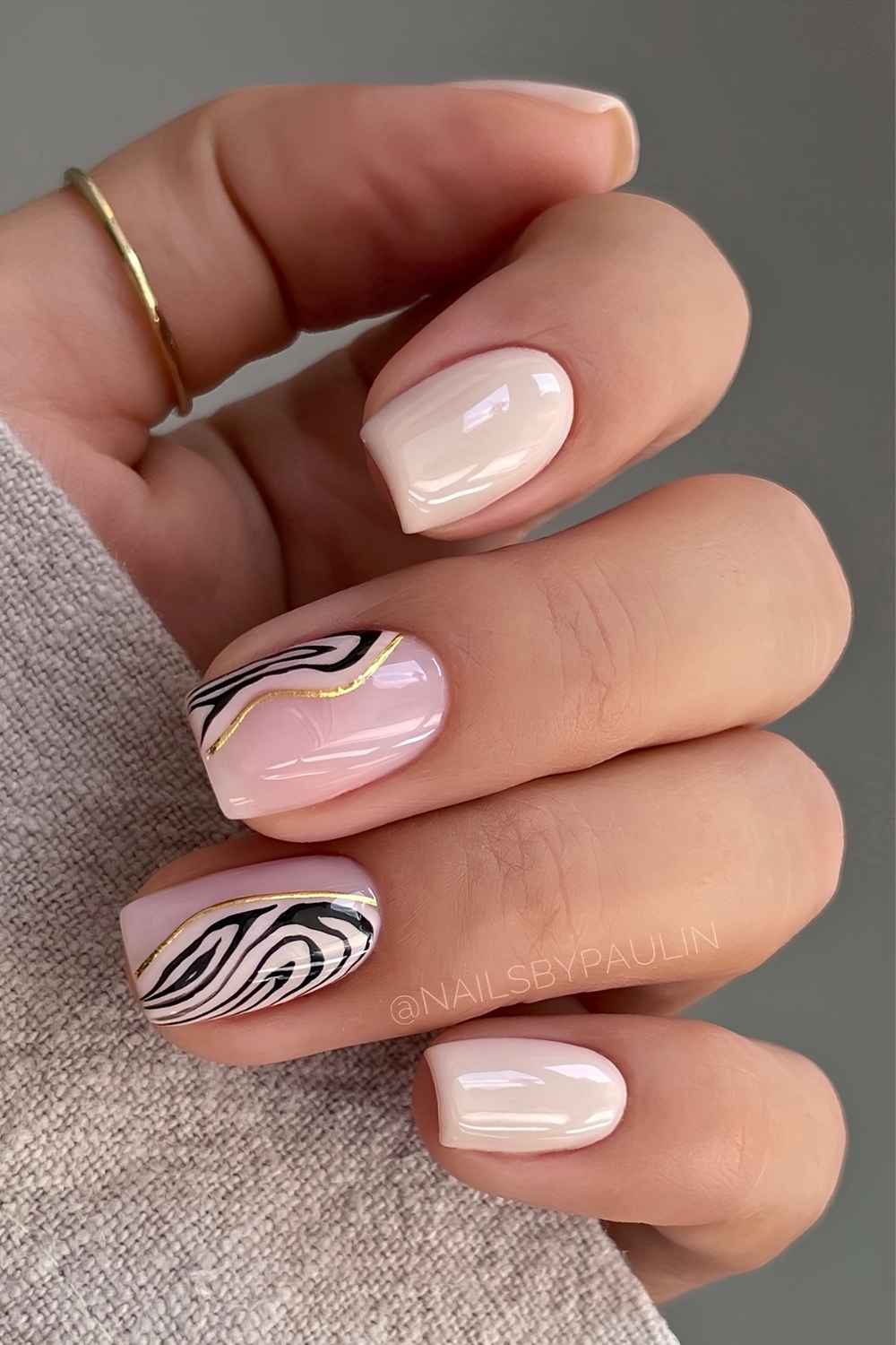 Short neutral mani with accent zebra stripes