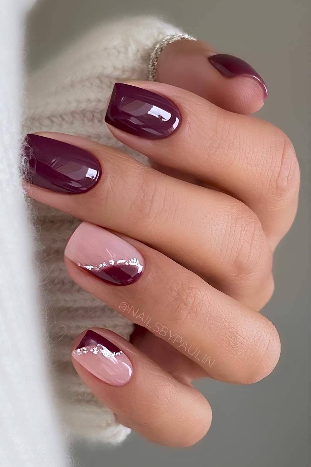 Short plum mani with silver glitter details