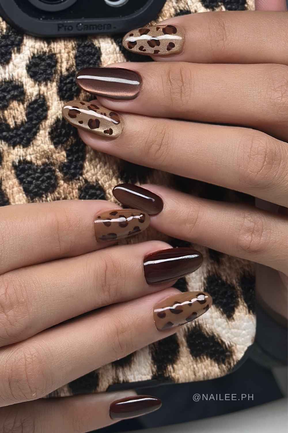 Taupe and brown cat eye mani with leopard print