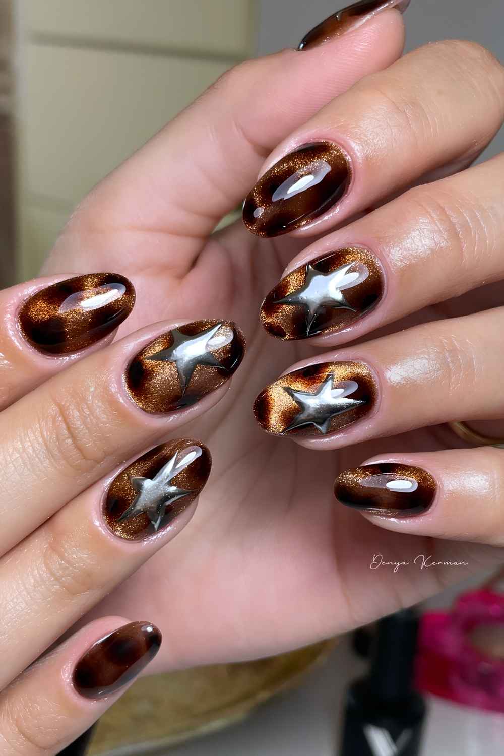 Tortoise shell cat eye mani with silver stars