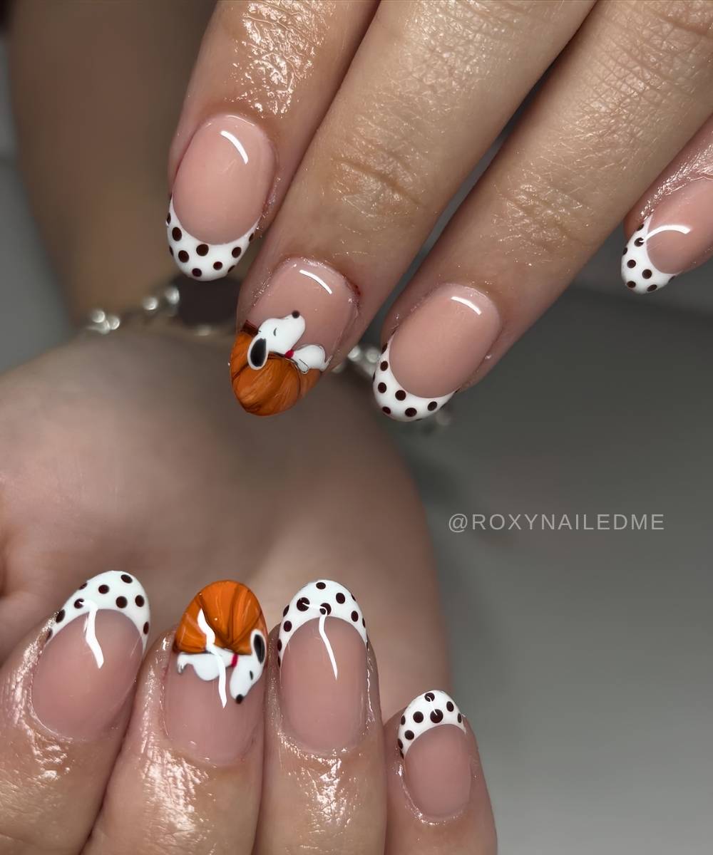 Dotted white French mani with pumkin and snoopy art