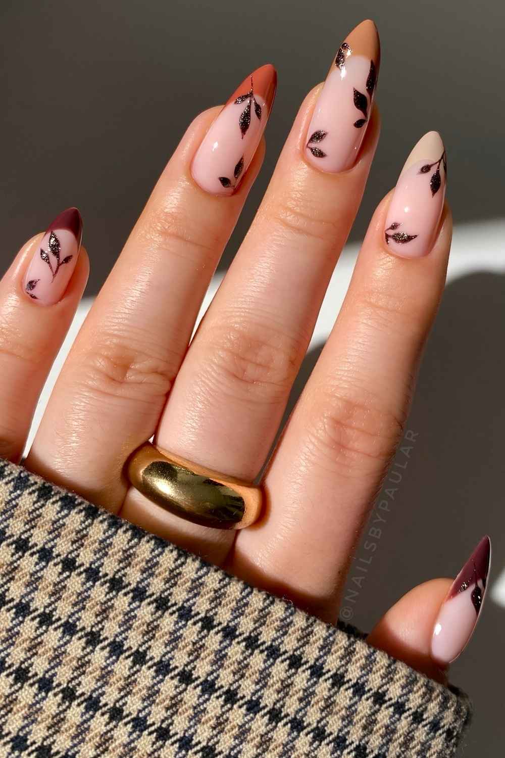 Earthy skittle French nails with shimmery leaf art