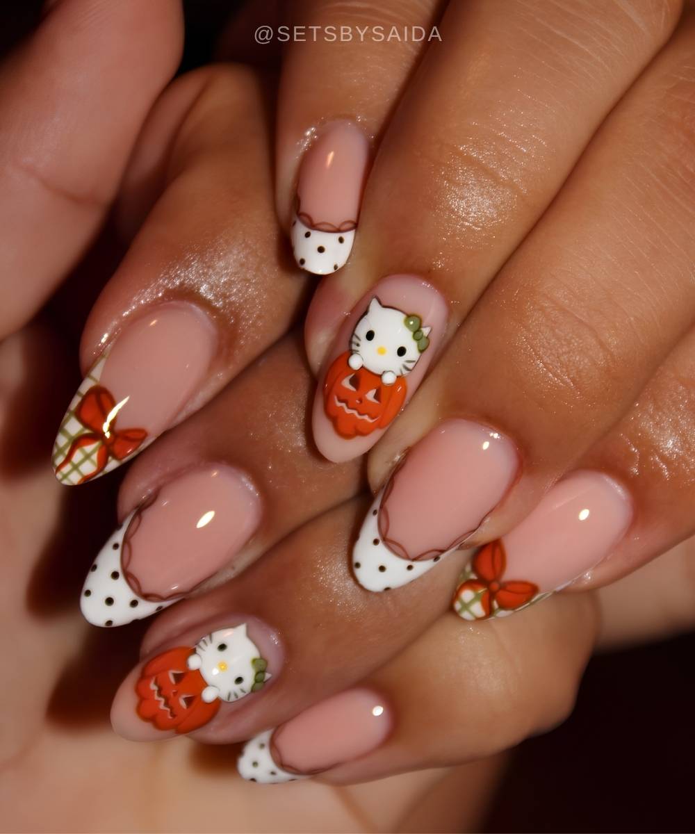 Fall French mani with pumpkins and hello kitty art