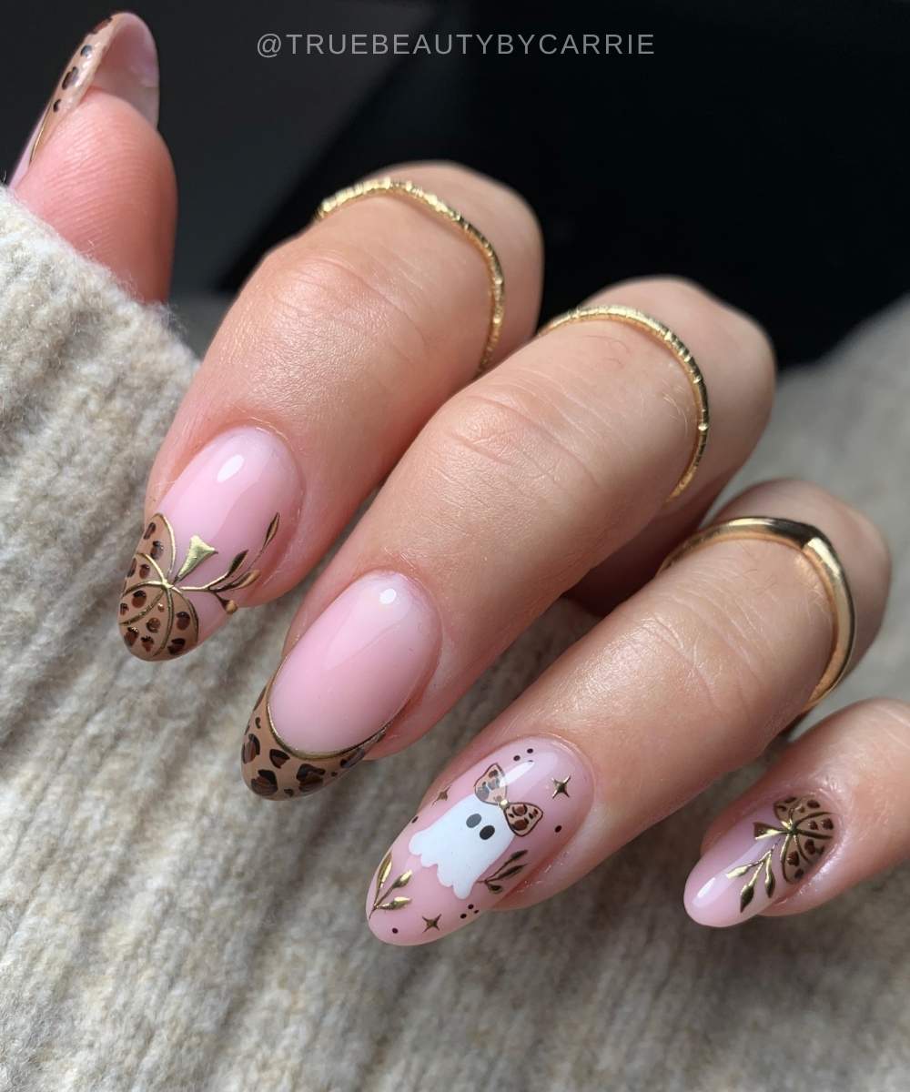 Leopard print nails with pumpkins