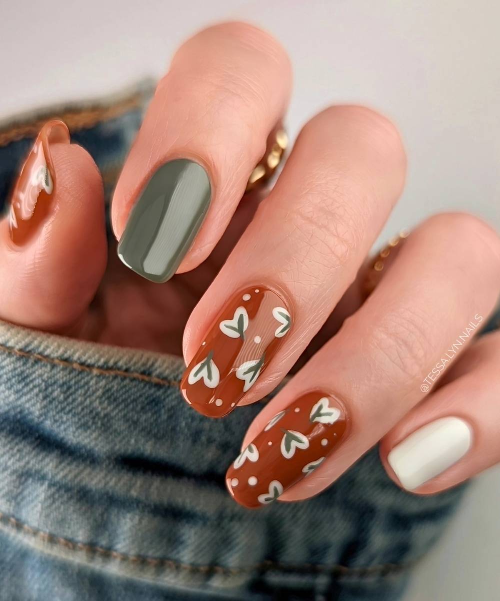 Terracotta and green nails with leaf details
