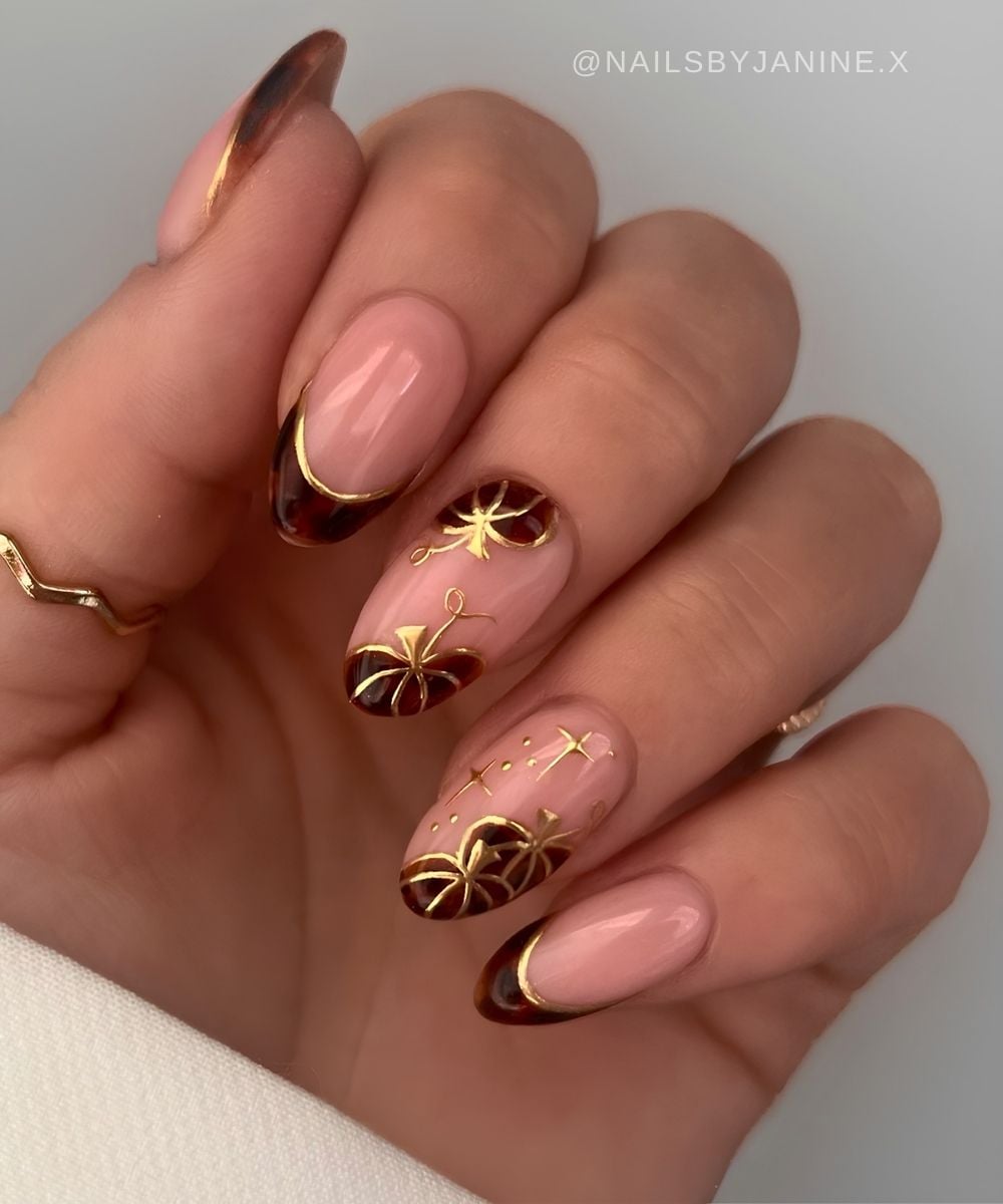 Tortie shell nails with pumpkins and gold details